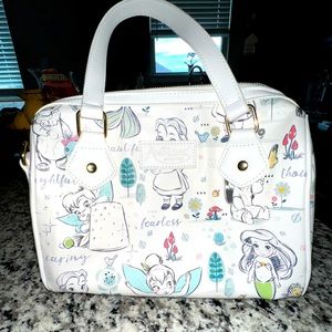 Very cute spacious Disney Animation Collection bag it’s Faux leather